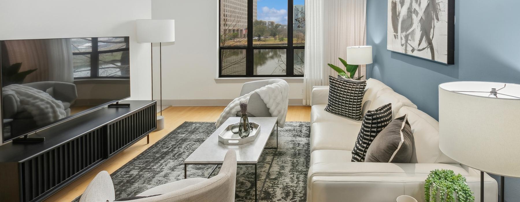 a modern living room with a large window